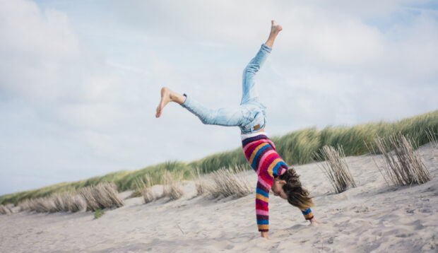 Learning To Do Handstands at Age 30 Healed My Relationship to Exercise After a Lifetime...