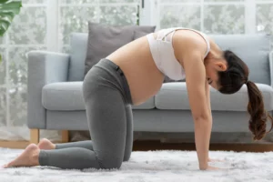 Release Your Lower Back To Relieve Pregnancy-Related Pain With These 4 Stretches